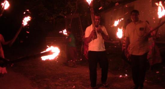 Fishermen light torches in protest