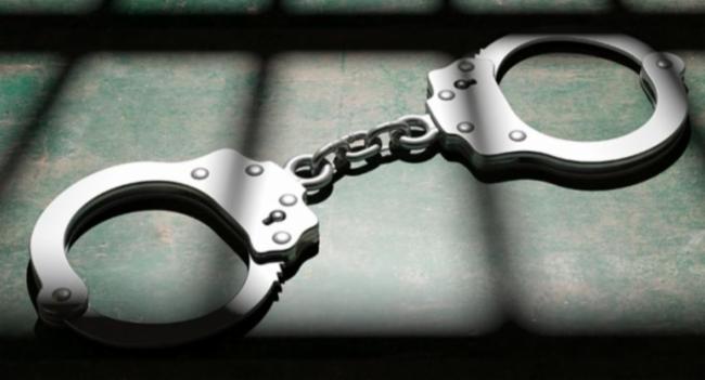 Two men arrested for stealing from tourist