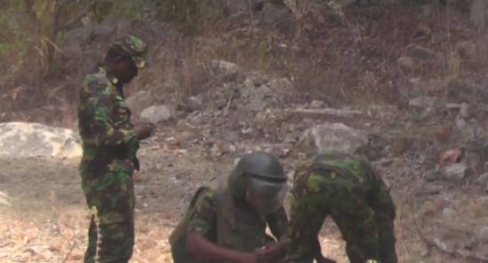 Firearms, Police Gear Found in Drug Raid