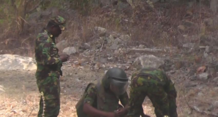 Firearms, Police Gear Found in Drug Raid