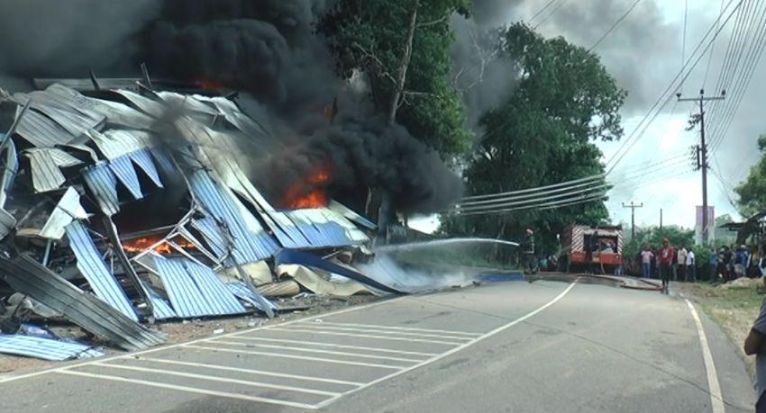 Smoke and emergency response at the Homagama helmet manufacturing factory fire in Sri Lanka.
