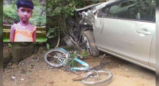 මිදුලට කඩා වැදුණු මෝටර් රථයට යට වී දැරියක් මරුට