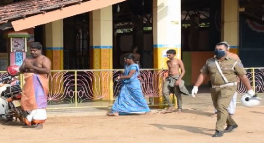 கிளிநொச்சியில் ஊரடங்கு நேரத்தில் அம்மன் ஆலயத்திற்கு சென்ற மக்களை பொலிஸார் திருப்பி அனுப்பினர்